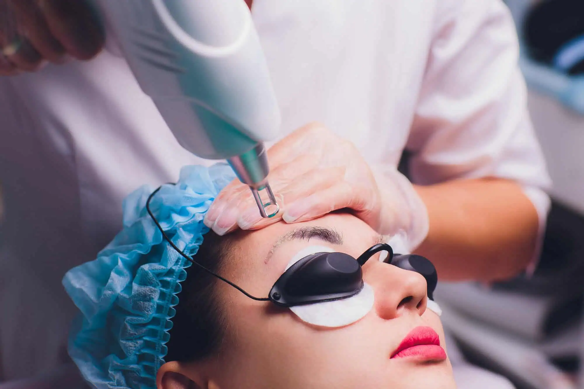 Woman receiving Laser Tattoo & Permanent Makeup Removal