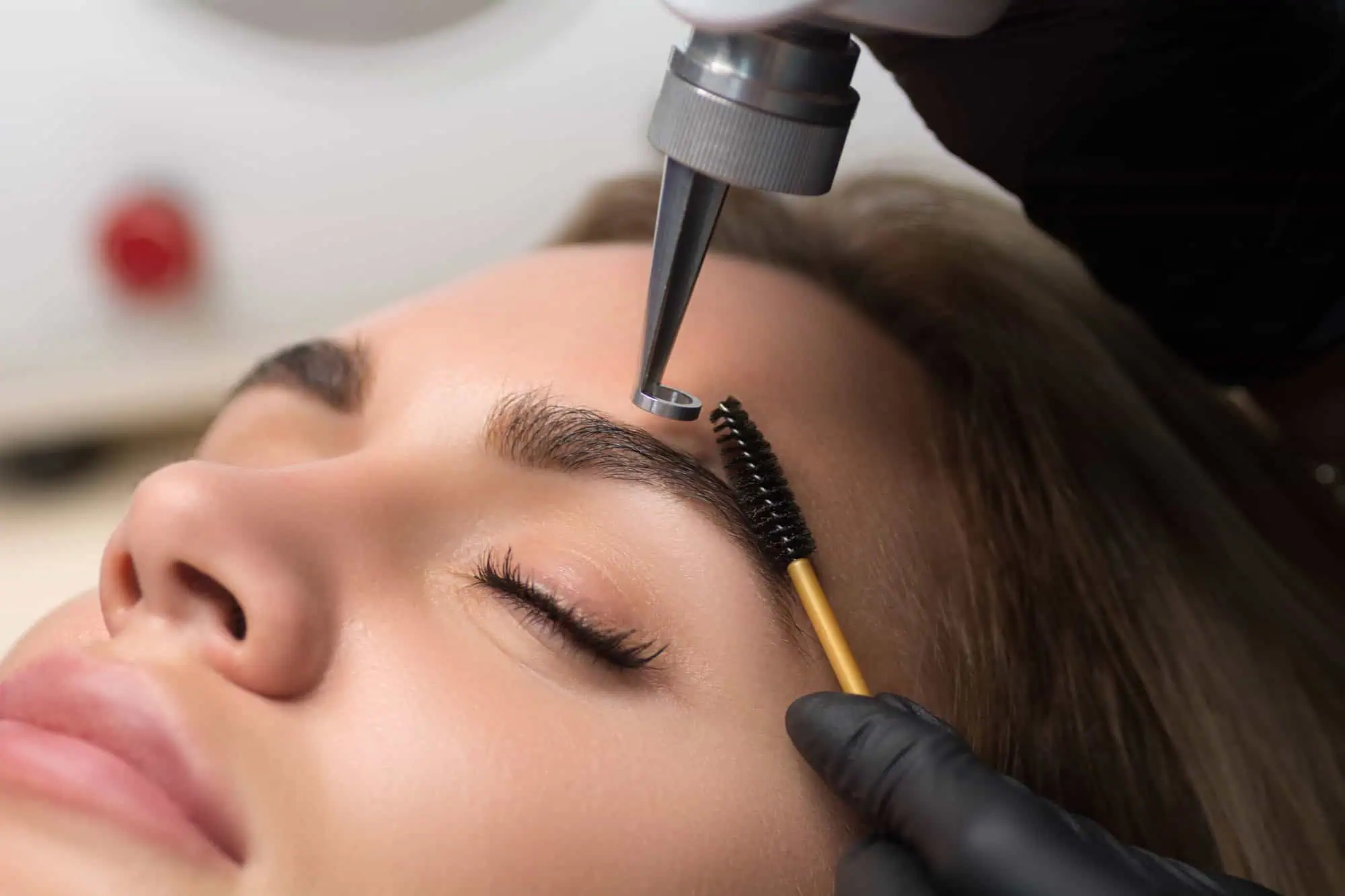 Woman receiving Laser Tattoo & Permanent Makeup Removal